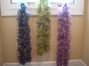 Picture of three Creation Ruffled Scarves